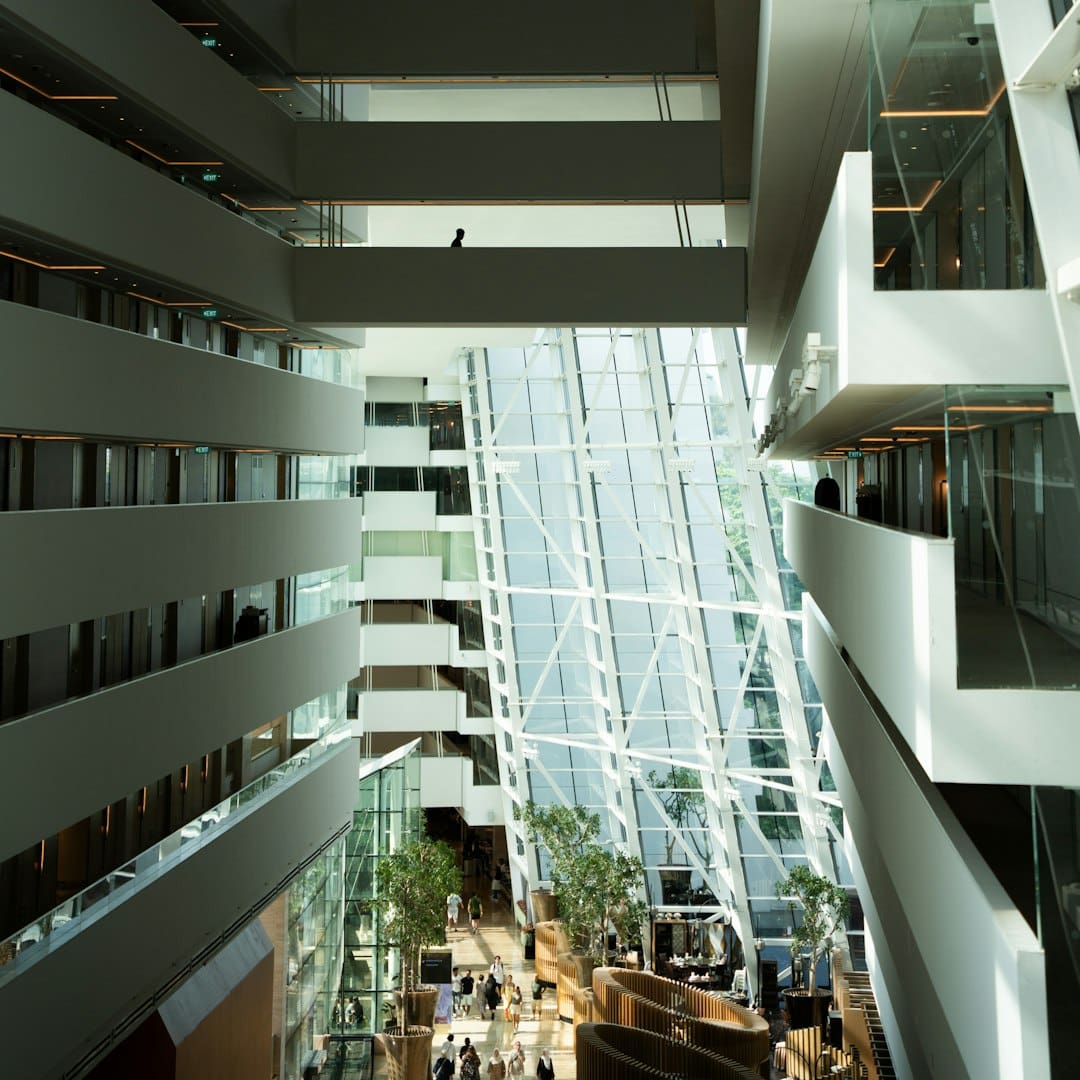 customer complaints service dogs — Modern atrium with glass elevator and balconies