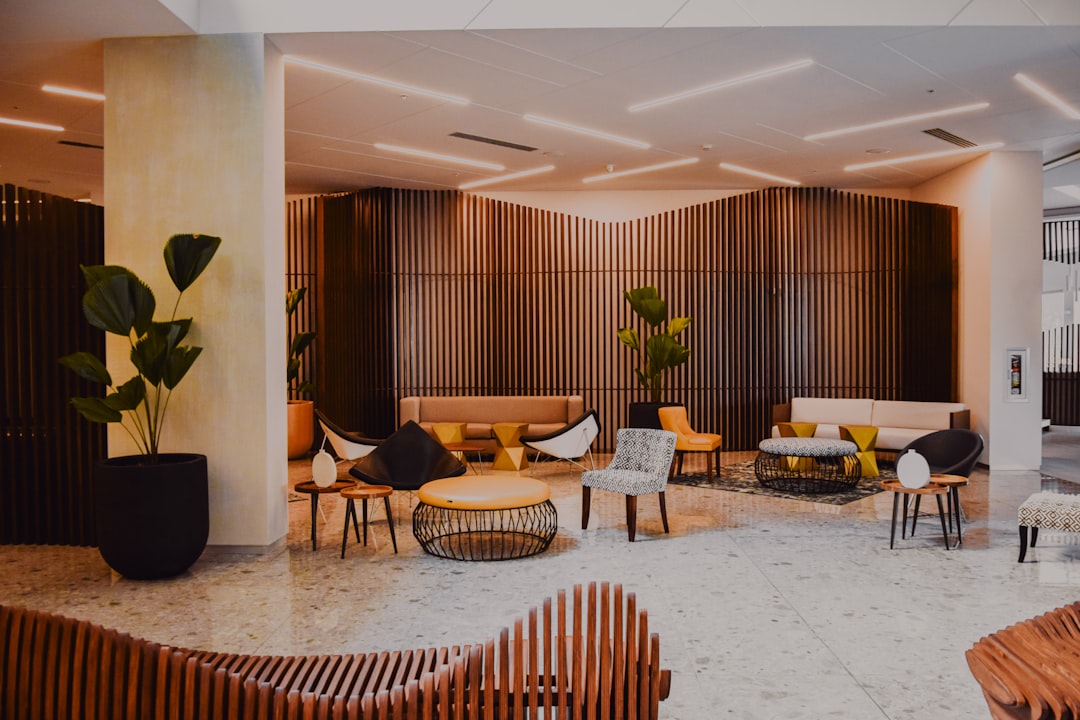 gym service dog — modern hotel lobby with designer furniture and wood walls