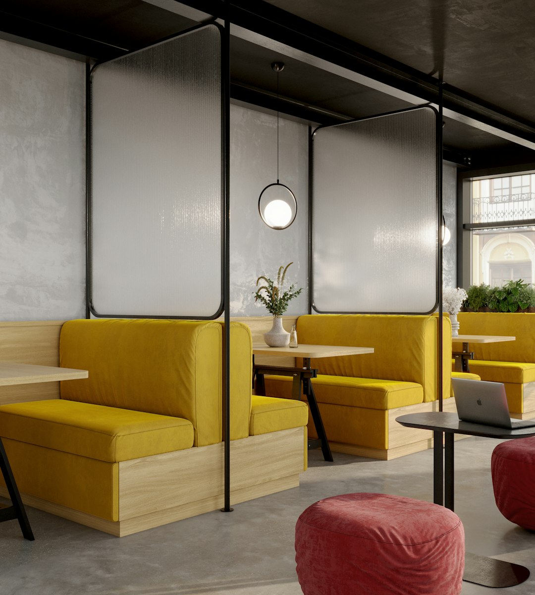 gym service dog — a room with yellow couches and a laptop on a table
